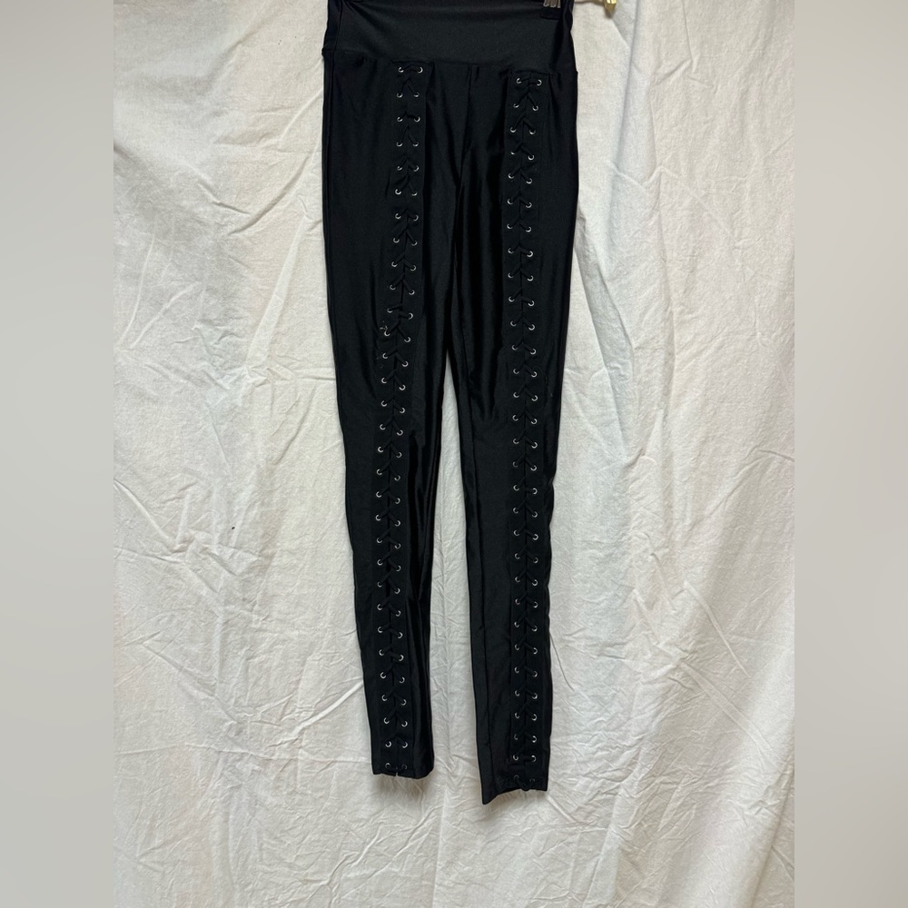 Forever 21 NWOT black leggings with laces and grommet detail on front